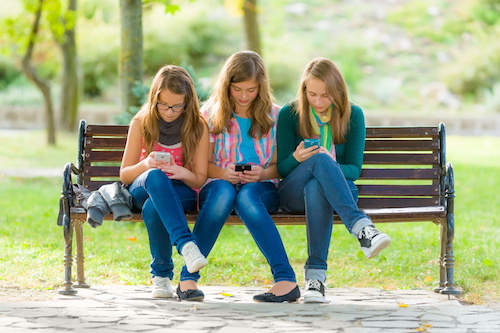 How to Save Money on Your Kid's Cell Phone
