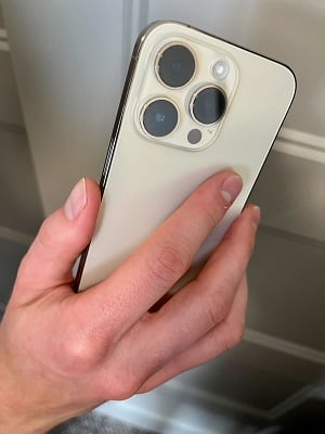 Ultimate Guide to iPhone - iPhone in hand