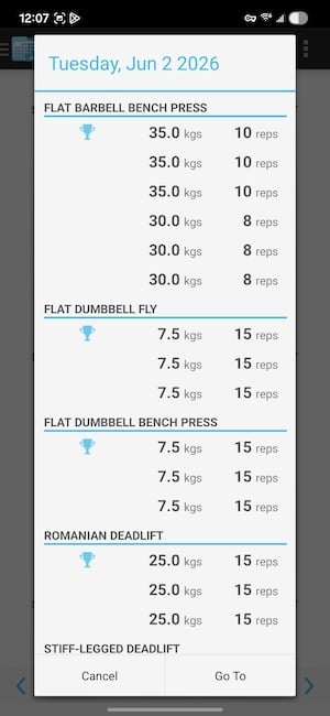 FitNotes exercise list showing barbell and dumbbell movements organized by muscle group