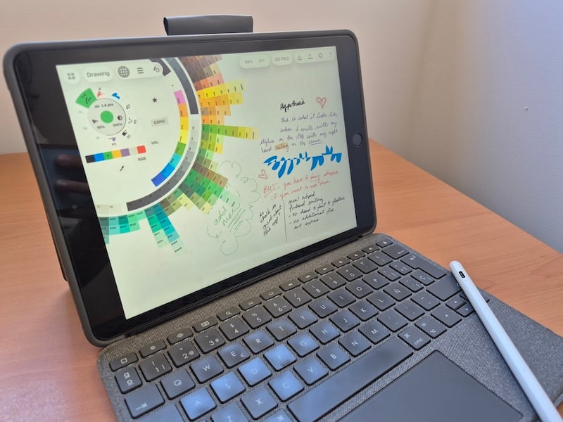 Image of my iPad, keyboard, and tablet stylus.