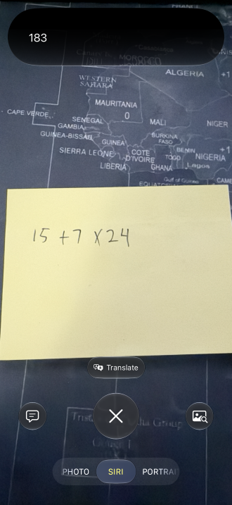Siri mode in the Camera app solving a math problem